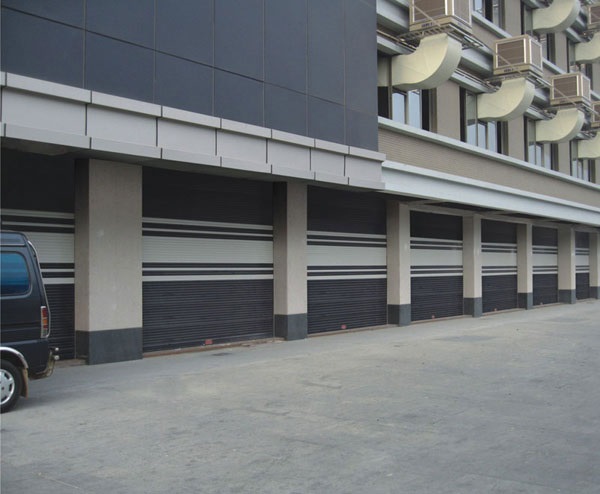 巨光卷簾門廠家支招：企業(yè)如何選擇適合的卷簾門電機？